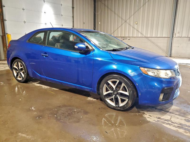 Photo 4 from auction – 2010 KIA FORTE SX with VIN KNAFW6A36A5158395