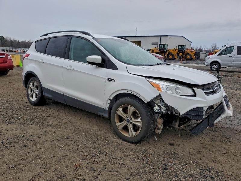 Photo 4 from auction – 2016 FORD ESCAPE SE with VIN 1FMCU9GX6GUA22432