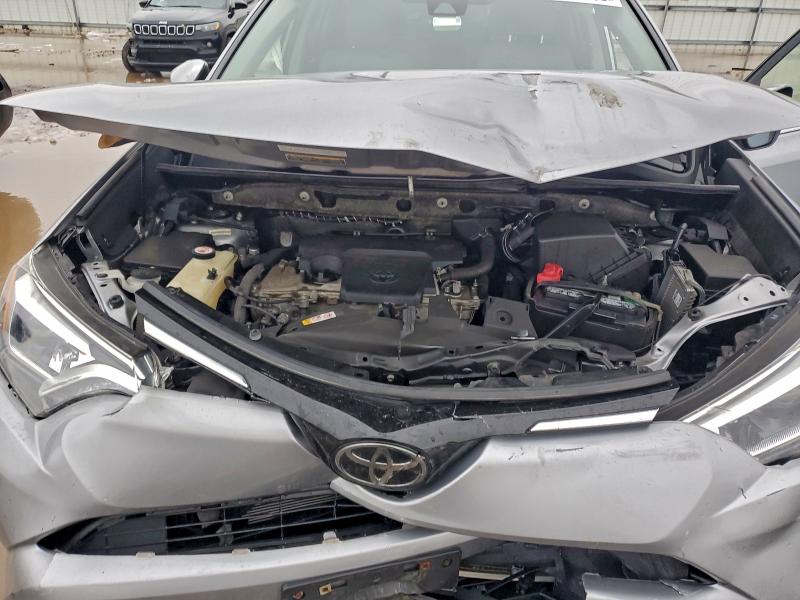 Photo 11 from auction – 2018 TOYOTA RAV4 LIMIT with VIN JTMDFREV8JD237984