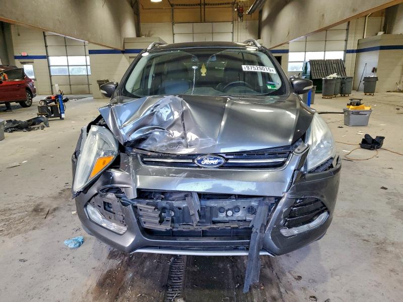 Photo 5 from auction – 2016 FORD ESCAPE TIT with VIN 1FMCU9JX4GUA92391
