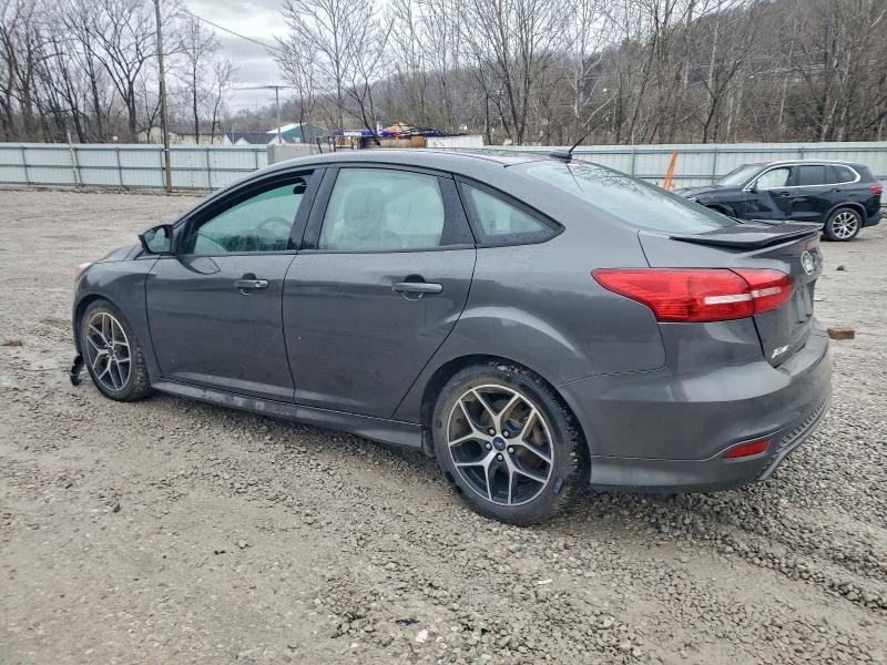 Photo 2 from auction – 2016 FORD FOCUS with VIN 1FADP3F26GL293201