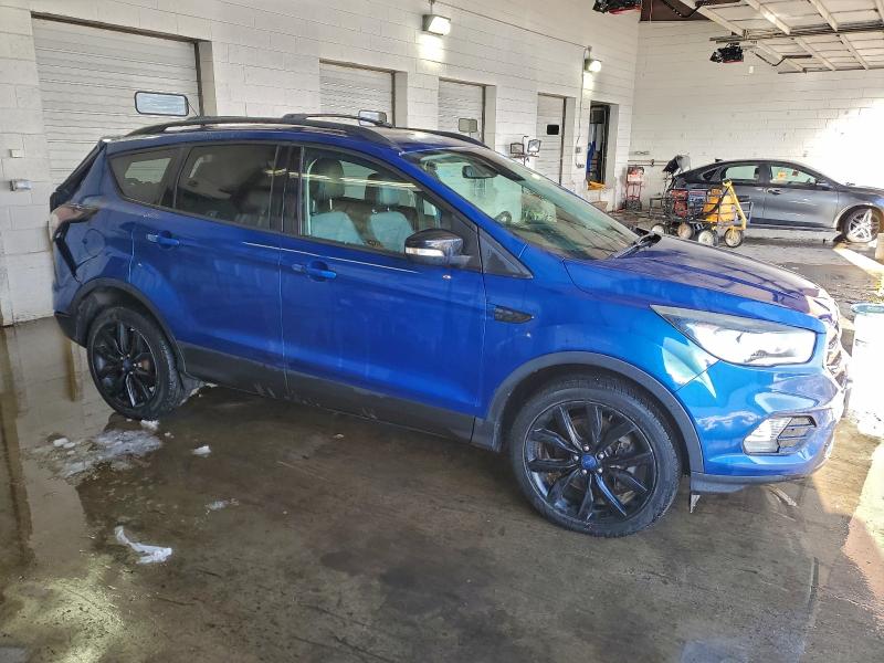 Photo 4 from auction – 2017 FORD ESCAPE TIT with VIN 1FMCU9J95HUB98402