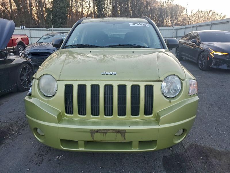 Photo 5 from auction – 2010 JEEP COMPASS SP with VIN 1J4NT4FB9AD515225
