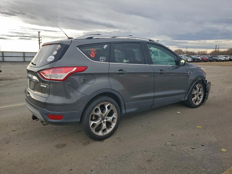 Photo 3 from auction – 2015 FORD ESCAPE TIT with VIN 1FMCU0J99FUA92155