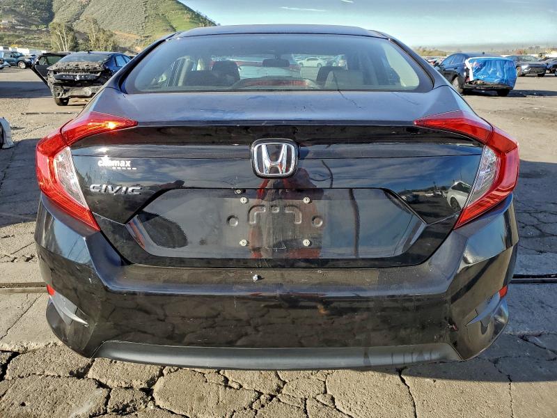 Photo 6 from auction – 2016 HONDA CIVIC LX with VIN 19XFC2F52GE016895