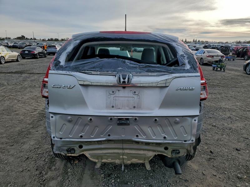 Photo 6 from auction – 2016 HONDA CR-V LX with VIN 2HKRM4H32GH602932