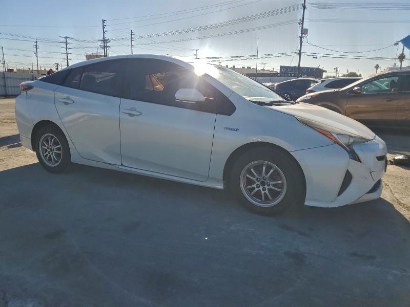 Photo 4 from auction – 2016 TOYOTA PRIUS with VIN JTDKBRFUXG3015440