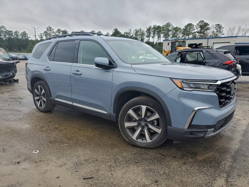 Photo 4 from auction – 2025 HONDA PILOT with VIN 5FNYG2H74SB027413
