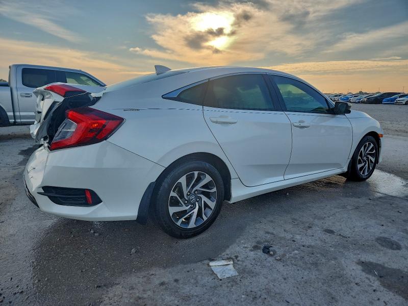 Photo 3 from auction – 2018 HONDA CIVIC EX with VIN 19XFC2F77JE038898