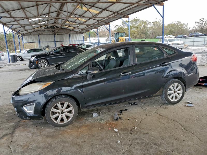 FORD FIESTA 2011 with VIN 3FADP4CJXBM186628 - Photo from auction