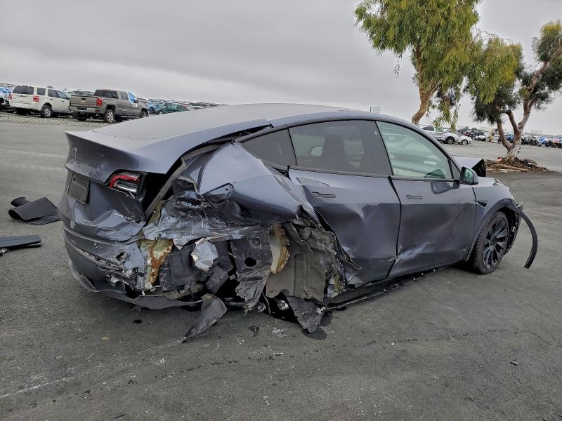 Photo 3 from auction – 2023 TESLA MODEL Y with VIN 7SAYGDEE2PF690360