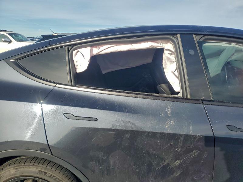 Photo 11 from auction – 2024 TESLA MODEL Y with VIN 7SAYGDEE6RA233289