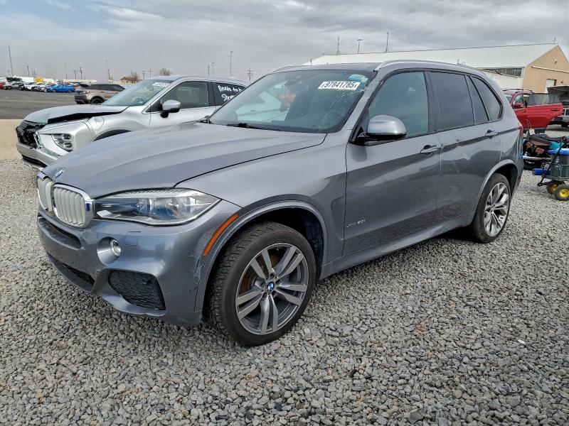 BMW X5 XDRIVE5 2014 with VIN 5UXKR6C54E0J72420 - Photo from auction