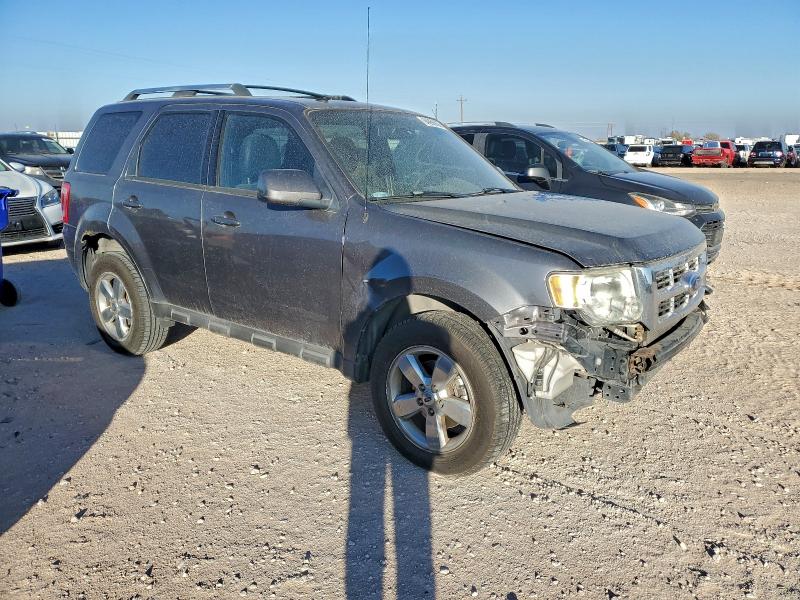 Photo 4 from auction – 2010 FORD ESCAPE LIM with VIN 1FMCU0E78AKA05715