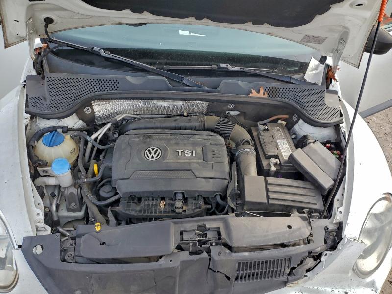 Photo 11 from auction – 2014 VOLKSWAGEN BEETLE with VIN 3VWF17AT8EM645988