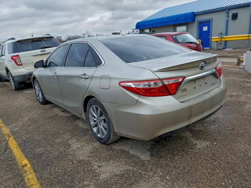 Photo 2 from auction – 2016 TOYOTA CAMRY HYBR with VIN 4T1BD1FK4GU178276