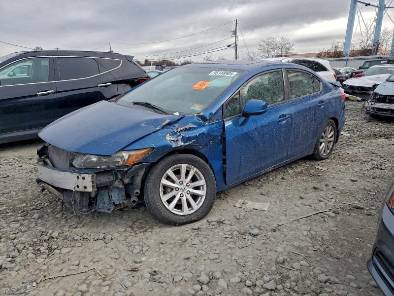 HONDA CIVIC EXL 2012 with VIN 2HGFB2F90CH502711 - Photo from auction
