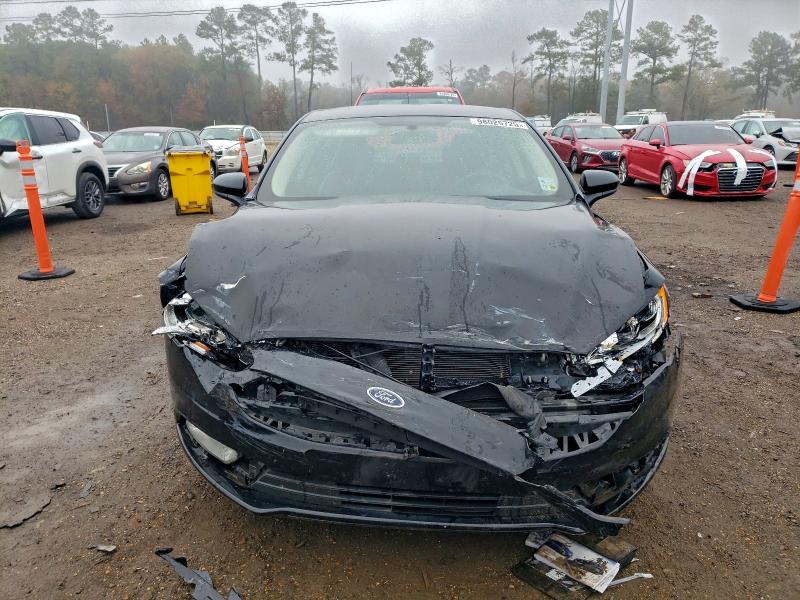 Photo 5 from auction – 2018 FORD FUSION with VIN 3FA6P0HDXJR136334