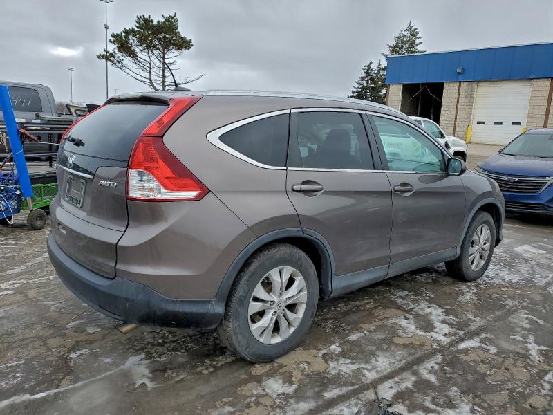 Photo 3 from auction – 2014 HONDA CR-V EXL with VIN 2HKRM4H73EH664890