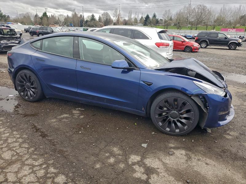 Photo 4 from auction – 2022 TESLA MODEL 3 with VIN 5YJ3E1EB9NF128535