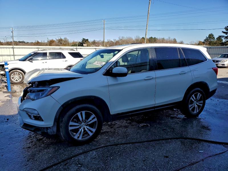 HONDA PILOT 2016 with VIN 5FNYF5H56GB024068 - Photo from auction