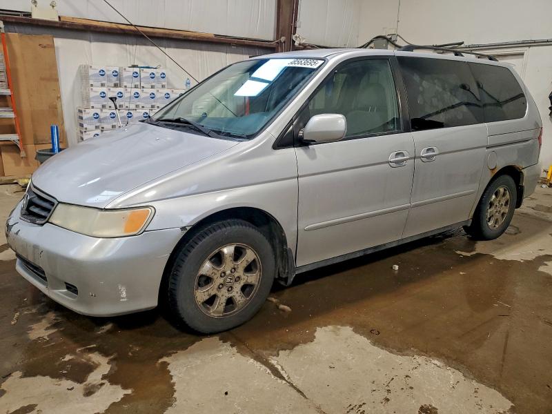 HONDA ODYSSEY EX 2003 with VIN 2HKRL18683H013194 - Photo from auction