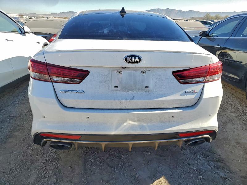 Photo 6 from auction – 2016 KIA OPTIMA with VIN 5XXGV4L29GG029526