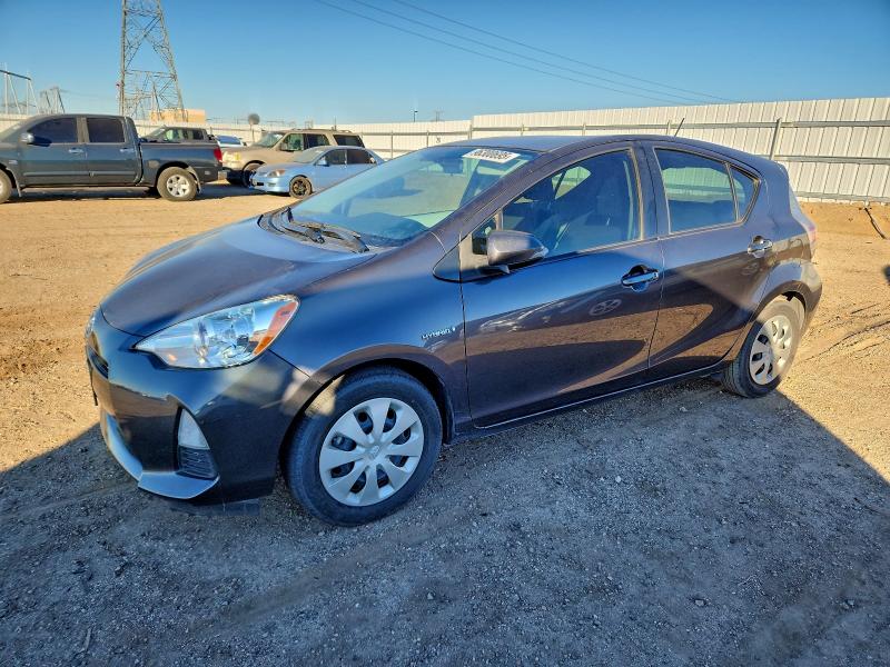 TOYOTA PRIUS C 2014 with VIN JTDKDTB33E1072883 - Photo from auction