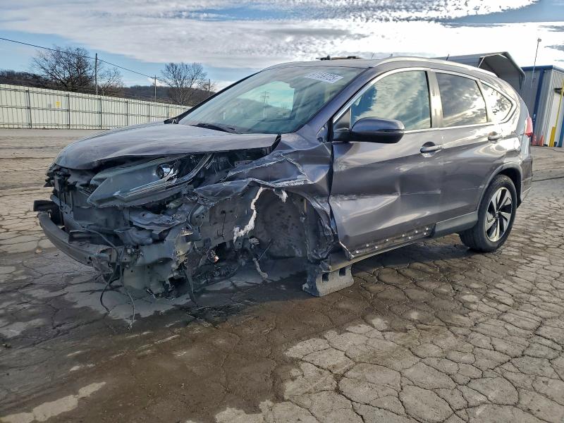 HONDA CR-V TOURI 2016 with VIN 5J6RM3H96GL014276 - Photo from auction
