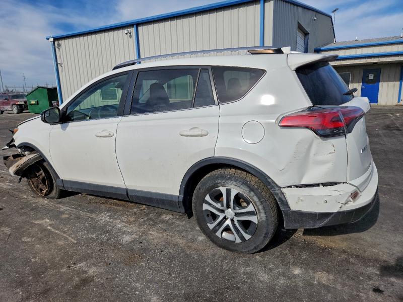Photo 2 from auction – 2018 TOYOTA RAV4 LE with VIN JTMZFREV2JJ212327