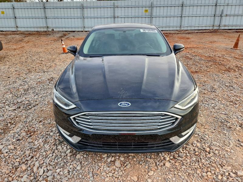 Photo 5 from auction – 2018 FORD FUSION TIT with VIN 3FA6P0RU0JR210343