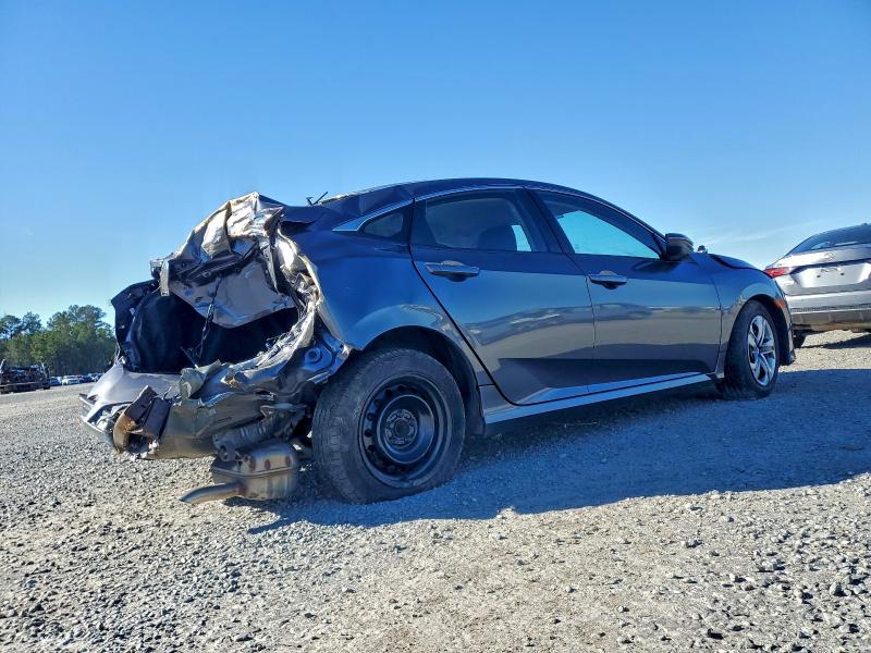 Photo 3 from auction – 2018 HONDA CIVIC LX with VIN 19XFC2F57JE033134