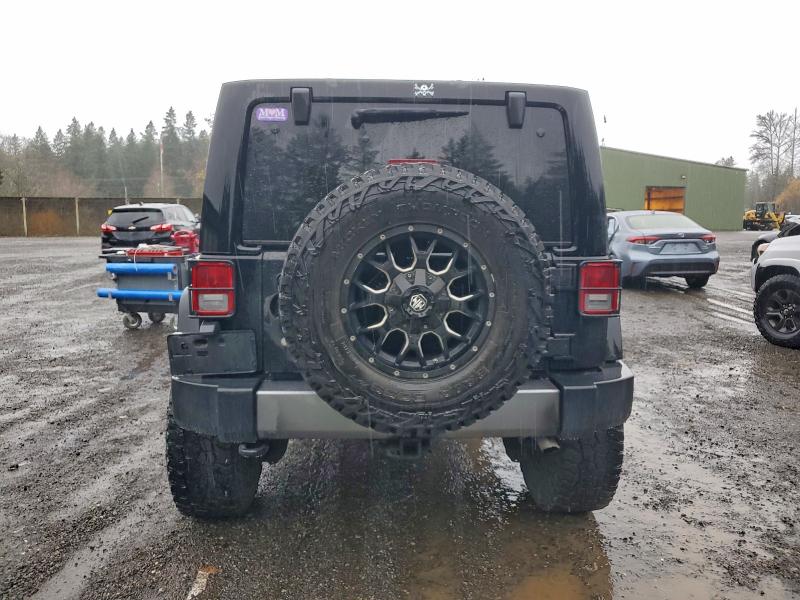 Photo 6 from auction – 2011 JEEP WRANGLER U with VIN 1J4BA3H14BL614842