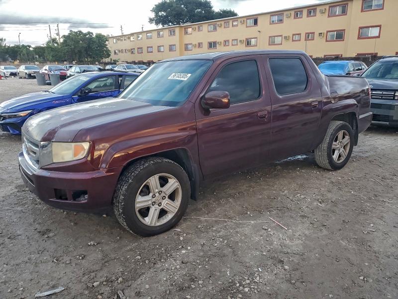 HONDA RIDGELINE 2011 with VIN 5FPYK1F50BB005796 - Photo from auction