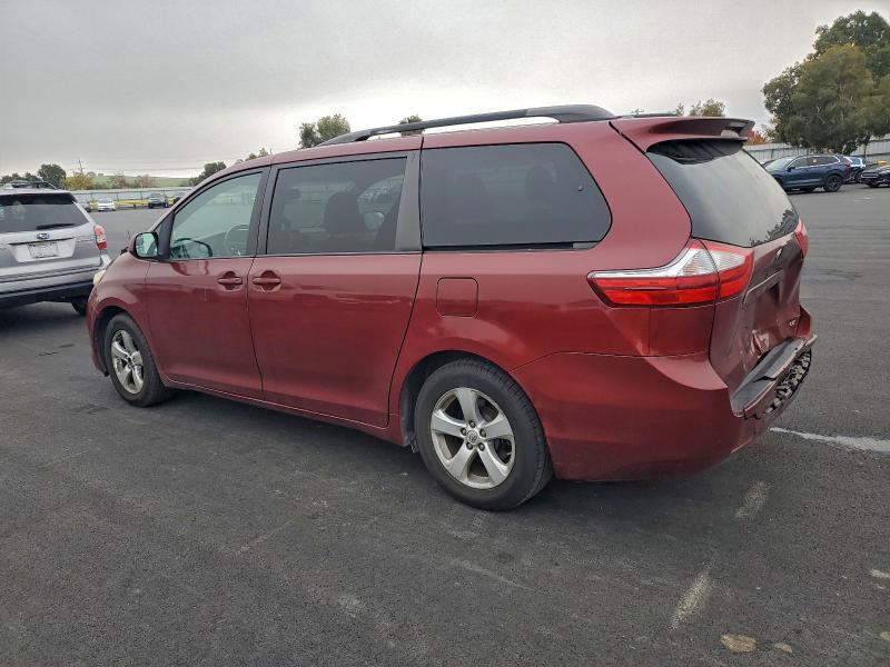 Photo 2 from auction – 2015 TOYOTA SIENNA LE with VIN 5TDKK3DC0FS618238