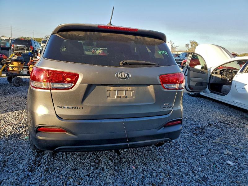 Photo 6 from auction – 2016 KIA SORENTO LX with VIN 5XYPG4A35GG082645