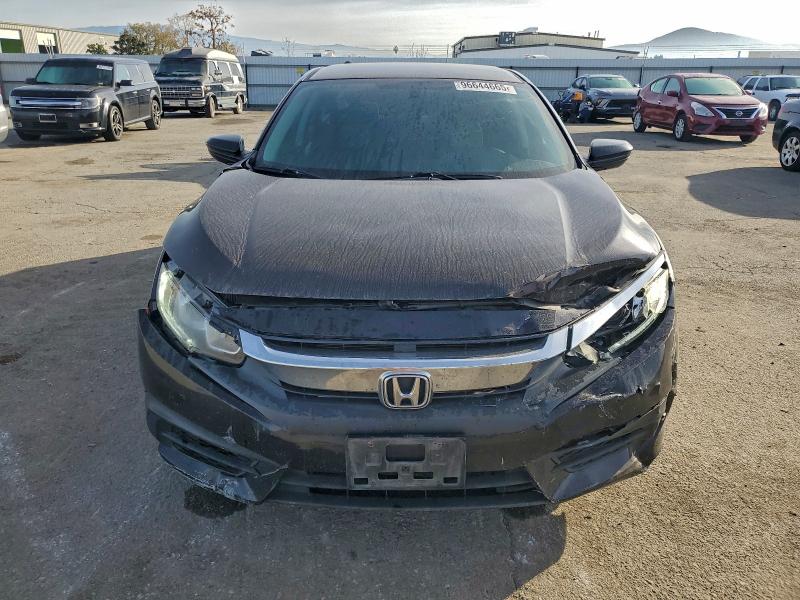Photo 5 from auction – 2016 HONDA CIVIC LX with VIN 2HGFC2F55GH501604