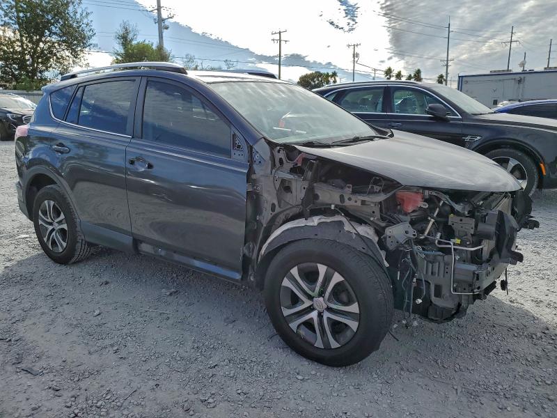 Photo 4 from auction – 2016 TOYOTA RAV4 LE with VIN JTMZFREV1GJ082792