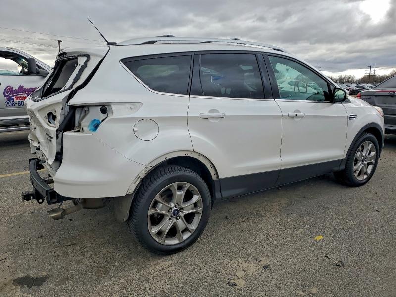 Photo 3 from auction – 2016 FORD ESCAPE TIT with VIN 1FMCU9J97GUC79691