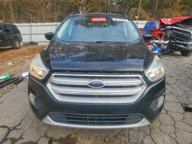 Photo 5 from auction – 2018 FORD ESCAPE SE with VIN 1FMCU0GD1JUA43651