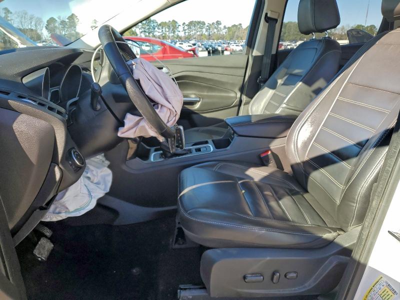 Photo 7 from auction – 2017 FORD ESCAPE TIT with VIN 1FMCU0J99HUC06884