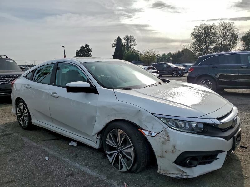 Photo 4 from auction – 2016 HONDA CIVIC EX with VIN 2HGFC1F33GH656841