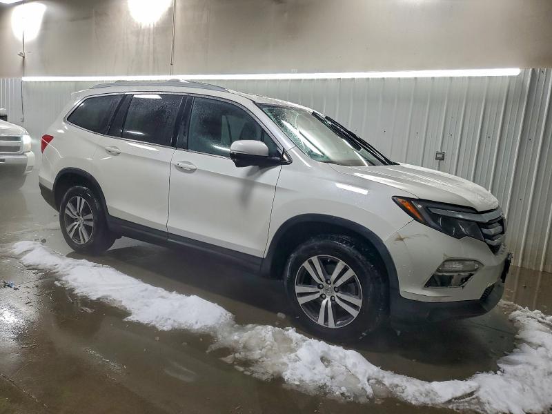 Photo 4 from auction – 2016 HONDA PILOT EXL with VIN 5FNYF6H82GB033172