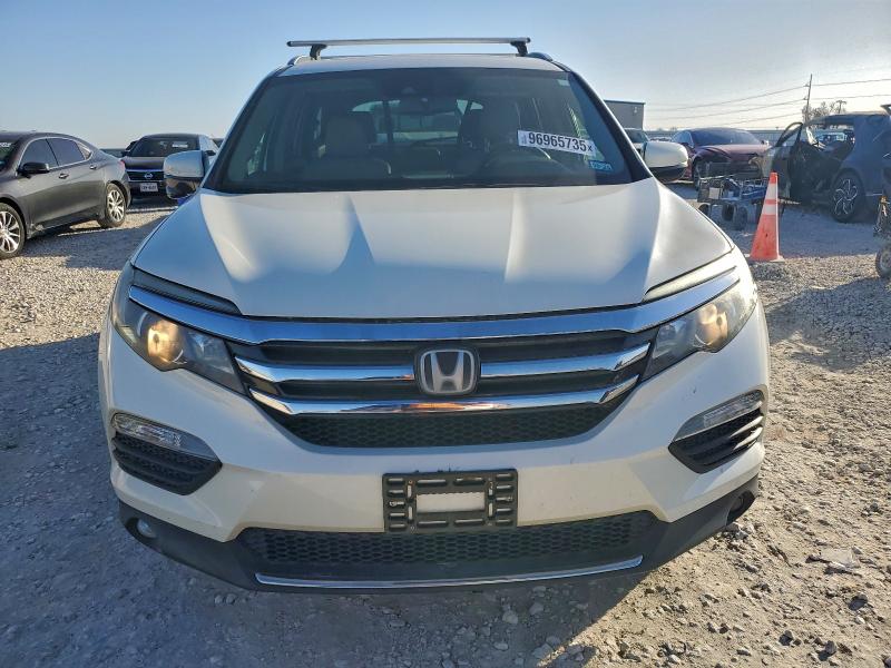 Photo 5 from auction – 2017 HONDA PILOT TOUR with VIN 5FNYF5H98HB027218