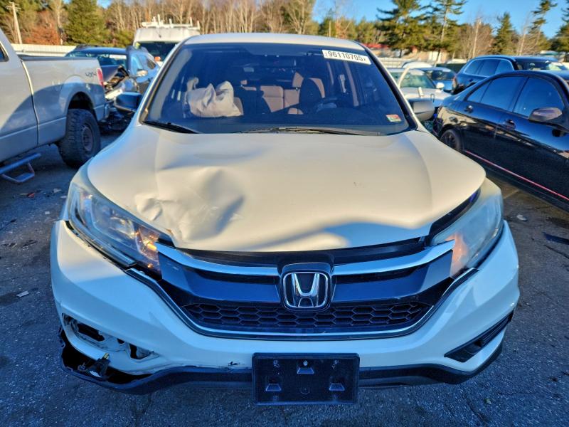 Photo 5 from auction – 2015 HONDA CR-V LX with VIN 5J6RM4H32FL117954