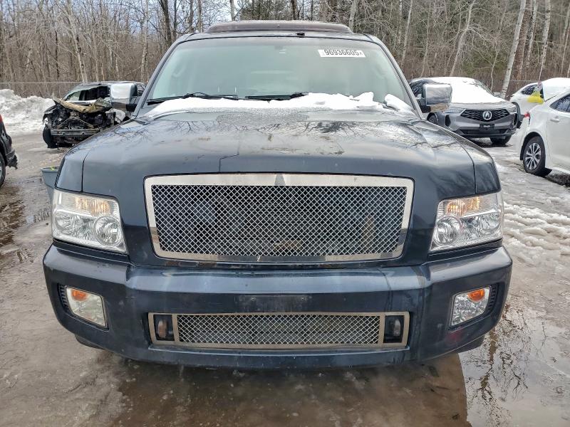 Photo 5 from auction – 2004 INFINITI QX56 with VIN 5N3AA08C64N811698