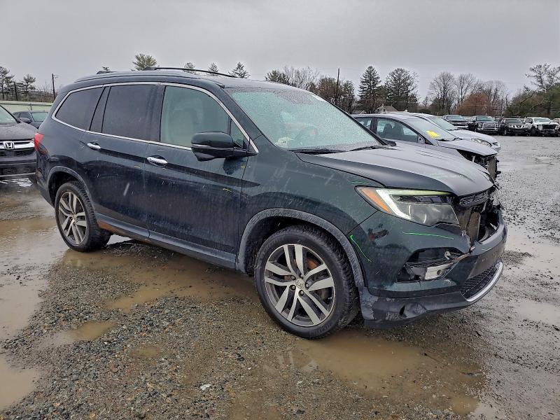 Photo 4 from auction – 2016 HONDA PILOT TOUR with VIN 5FNYF6H96GB009319