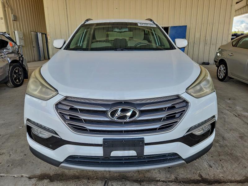 Photo 5 from auction – 2017 HYUNDAI SANTA FE S with VIN 5NMZU3LB0HH046062