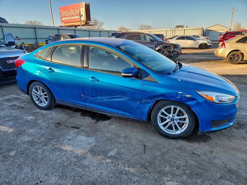 Photo 4 from auction – 2015 FORD FOCUS SE with VIN 1FADP3F23FL239241