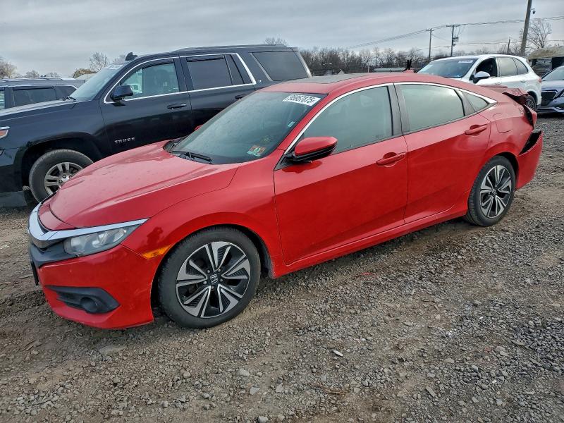 Photo 1 from auction – 2017 HONDA CIVIC with VIN 2HGFC1F34HH640424